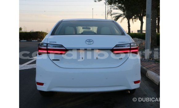 Buy Import Toyota Corolla White Car in Import - Dubai in Ali Sabieh Region Buy Import Toyota Corolla White Car in Import - Dubai in Ali Sabieh Region