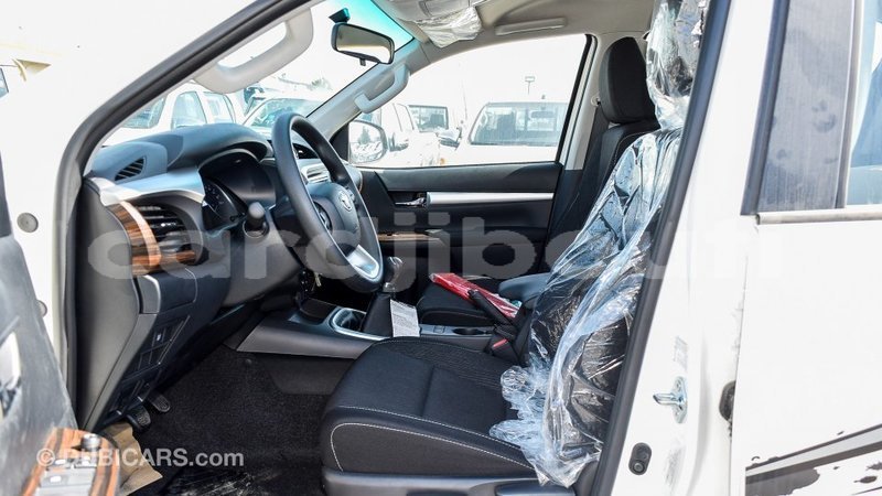 Big with watermark toyota hilux ali sabieh region import dubai 2102