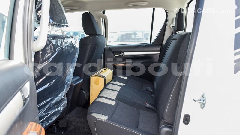 Big with watermark toyota hilux ali sabieh region import dubai 2102