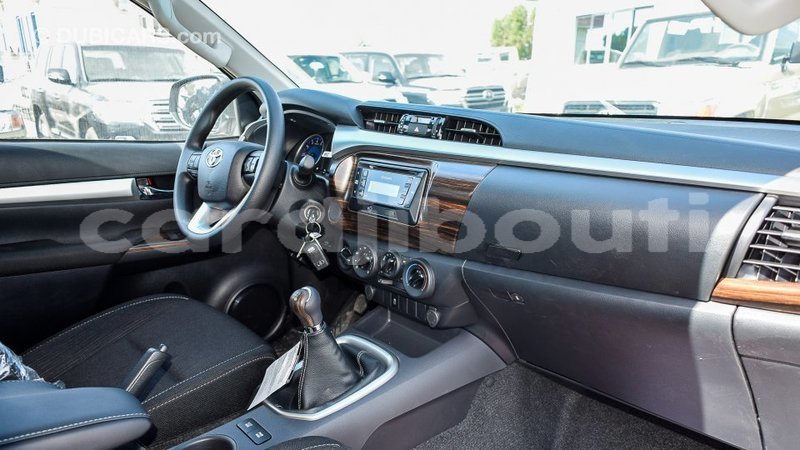 Big with watermark toyota hilux ali sabieh region import dubai 2102