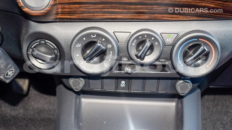 Big with watermark toyota hilux ali sabieh region import dubai 2102