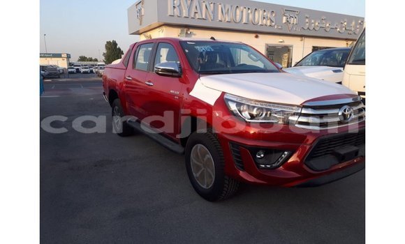 Buy Import Toyota Hilux Red Car in Import - Dubai in Ali Sabieh Region Buy Import Toyota Hilux Red Car in Import - Dubai in Ali Sabieh Region