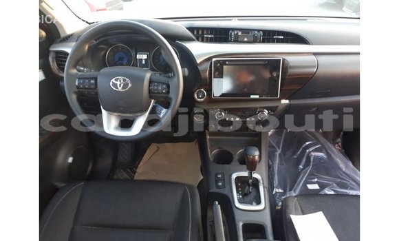 Buy Import Toyota Hilux Red Car in Import - Dubai in Ali Sabieh Region Buy Import Toyota Hilux Red Car in Import - Dubai in Ali Sabieh Region