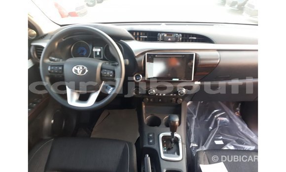 Buy Import Toyota Hilux Red Car in Import - Dubai in Ali Sabieh Region Buy Import Toyota Hilux Red Car in Import - Dubai in Ali Sabieh Region