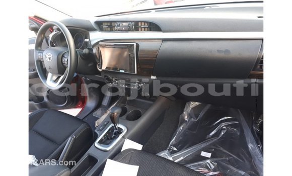 Buy Import Toyota Hilux Red Car in Import - Dubai in Ali Sabieh Region Buy Import Toyota Hilux Red Car in Import - Dubai in Ali Sabieh Region