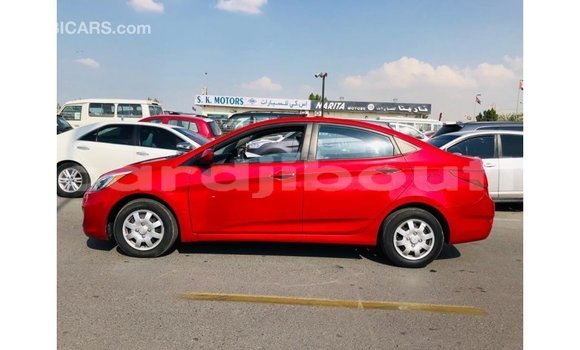 Buy Import Hyundai Accent Red Car in Import - Dubai in Ali Sabieh Region Buy Import Hyundai Accent Red Car in Import - Dubai in Ali Sabieh Region