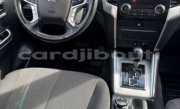 Buy Used Mitsubishi L200 White Car in Djibouti city in East africa Buy Used Mitsubishi L200 White Car in Djibouti city in East africa